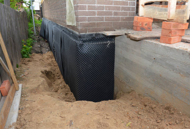 SJ Waterproofing Pros technician performing targeted Emergency Waterproofing assessment in Wawaka, IN